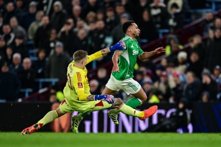 Marco Bizot brings down Jacob Murphy.