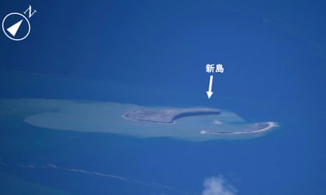 An image released by Japan’s coastguard shows the new crescent-shaped island.