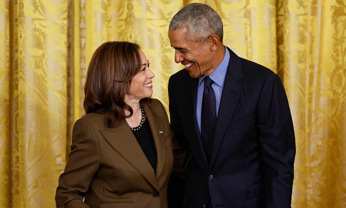 Vice president Kamala Harris and former president Barack Obama smile at each other at an event marking the 2010 passage of the Affordable Care Act in the East Room of the White House on April 5, 2022 in Washington, DC.