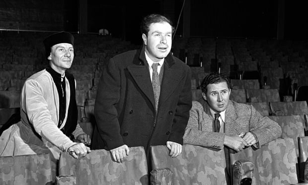 Peter Brook, centre, in the stalls of the Shakespeare Memorial Theatre, Stratford upon Avon, with Anthony Quayle, right, director of the theatre, and John Gielgud, left, as Angelo in Brook’s production of Measure for Measure, 1950.
