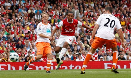 Arsenal’s Theo Walcott introduces Blackpool to the Premier League back in 2010.