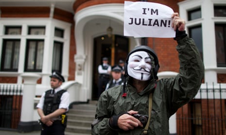 A supporter of Julian Assange stands outside the Ecuadorian embassy in London on August 16, 2012.