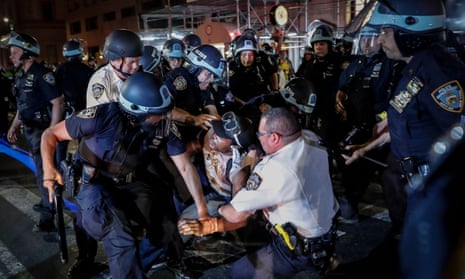 Protester arrested by NYPD officers during a march in June 2020, following the death of George Floyd.