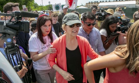 Elizabeth Warren walks past the Homestead detention center, where migrant teens are held, in Homestead, Florida, on 26 June.