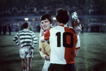 Willem van Hanegem embraces Evan Williams at the end of extra time