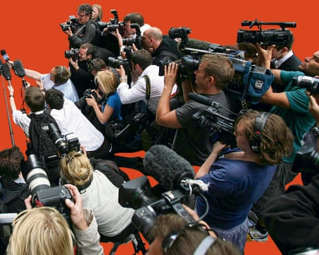 A scrum of journalists at a press event