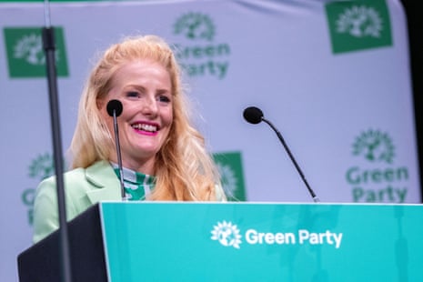 Hannah Spencer speaking on stage during the Greens’ conference in 2024