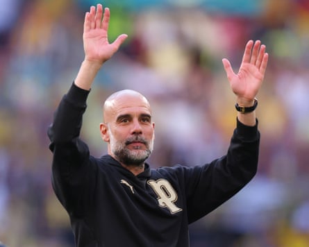 Pep Guardiola waves after the Emirates FA Cup Semi Final match between Manchester City and Southampton