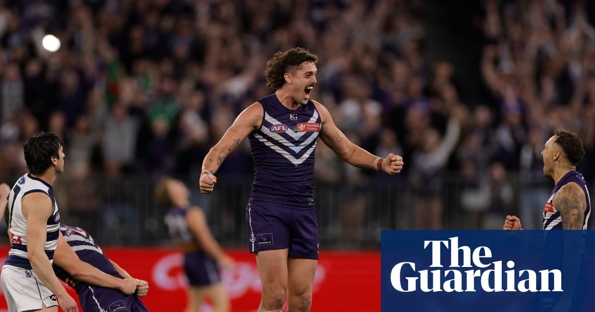 Fremantle keep AFL premiership dream alive with win against Geelong in finals classic