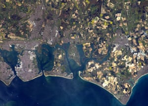 South Coast, UKPortsmouth and Hayling Island are the two islands in the centre of the image. The colourful land mass jutting out into the sea at the right of the picture includes West Wittering on the coastline, and Chichester harbour. Farther north-east going inland, you will see Chichester, my home city.