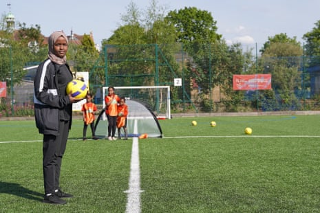 Football Association referee Jawahir Roble oversees a girls’ training session