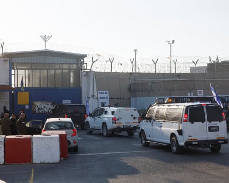 Vehicles move outside the Israeli military prison Ofer in the Israeli-occupied West Bank