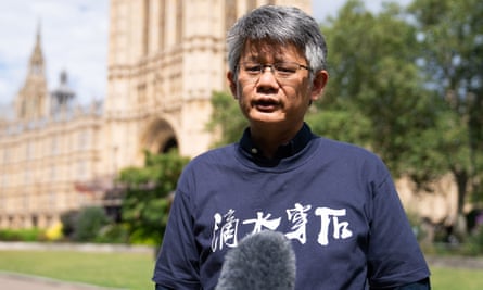 Christopher Mung talks to the media on College Green, London, on 5 July.