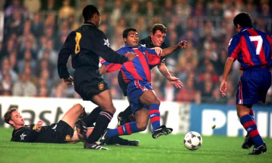 Barcelona’s Romario cuts a swathe through the Manchester United defence during their Champions League group game at the Camp Nou in November 1994.