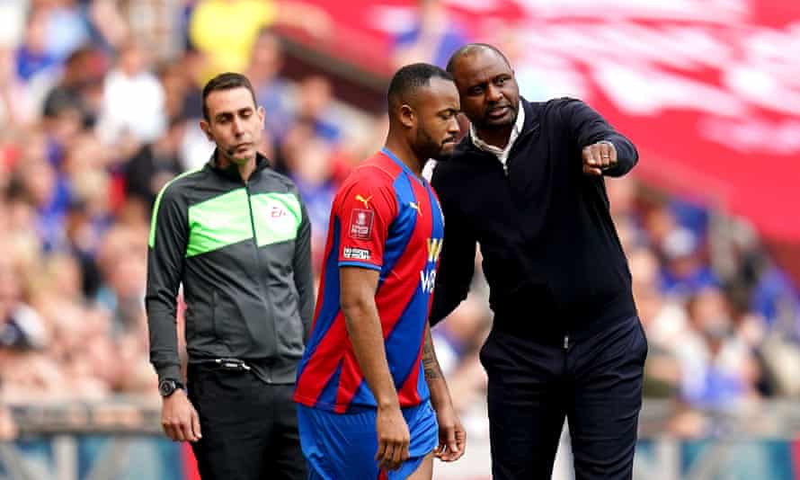Crystal Palace manager Patrick Vieira speaks to Jordan Ayew before he comes on.