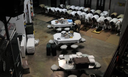 Detainees pray in a communal area of Camp Six in 2011.