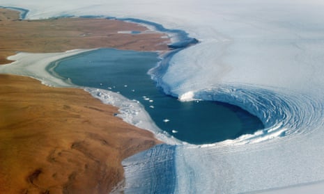 Summer snowmelt along the flank of Greenland's Humboldt Glacier exposes layers of ice from ancient climate periodsepa07875699 A handout photo made available by NASA shows an aerial view of a lake bounded to the left by Washington Land, a deglaciated peninsula that juts into the Kane Basin, and at right by the Humboldt Glacier, Greenland's widest marine-terminating glacier, 04 September 2019 (issued 28 September 2019). The image was taken by John Sonntag, a scientist at NASA's Goddard Space Flight Center, during an airborne campaign for NASA's Operation IceBridge. The flight was one of 11 flown in September 2019 on NASA's Gulfstream-V to measure summer melting on Greenland. The measurements will be compared to those collected during the IceBridge campaign in spring 2019, and with measurements from the new Ice, Cloud and land Elevation Satellite-2 (ICESat-2), which launched one year ago. EPA/JOHN SONNTAG/OPERATION ICEBRIDGE/NASA HANDOUT HANDOUT EDITORIAL USE ONLY/NO SALES