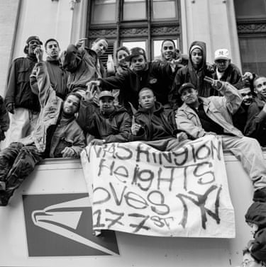 a group of men holding a sign