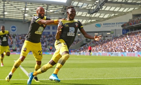 Moussa Djenepo celebrates scoring Southampton’s opening goal against Brighton.