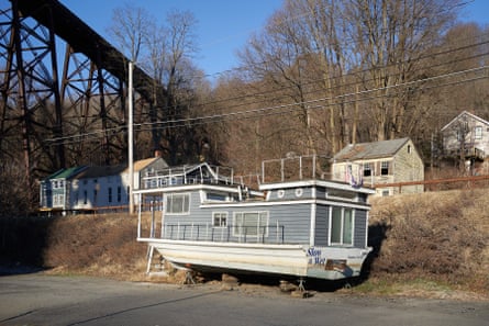 A houseboat sits on the shore of Kingston’s Rondout Creek, a popular area for short-term vacation rentals.