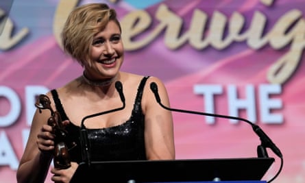 Greta Gerwig accepts the best director award at the Palm Springs gala on 4 January.