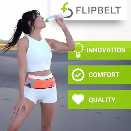 woman wearing orange running belt and white workout set sips water outside