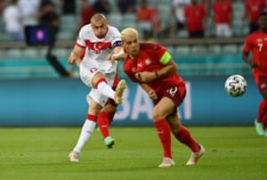 Burak Yilmaz has a go from long range.