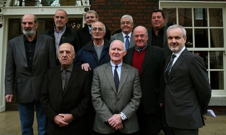 Some of the surviving detainees pictured in 2014, with Amnesty International’s Colm O’Gorman, front right