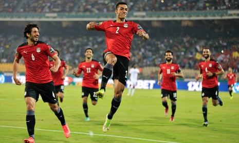 Egypt's Mohamed Abdelmonem celebrates after opening the scoring.