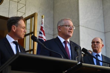 Minister for health Greg Hunt, prime minister Scott Morrison and deputy chief medical officer Paul Kelly give a coronavirus update on 27 February.