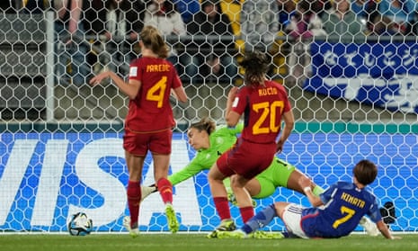 Japan’s Hinata Miyazawa slots the ball home to open the scoring against Spain.