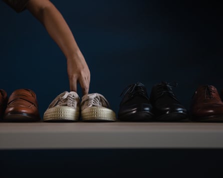 Men Footwear Fashion. Male Picking a Sneaker Shoes to Wearing. Quit a Job or be Balanced Relaxation Concept