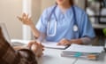 Stock image of a doctor consulting with a patient