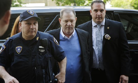 Nicholas DiGaudio, right, escorts Harvey Weinstein into court in New York on 25 May. DiGaudio apparently coached a witness to delete information before handing her phone to prosecutors.