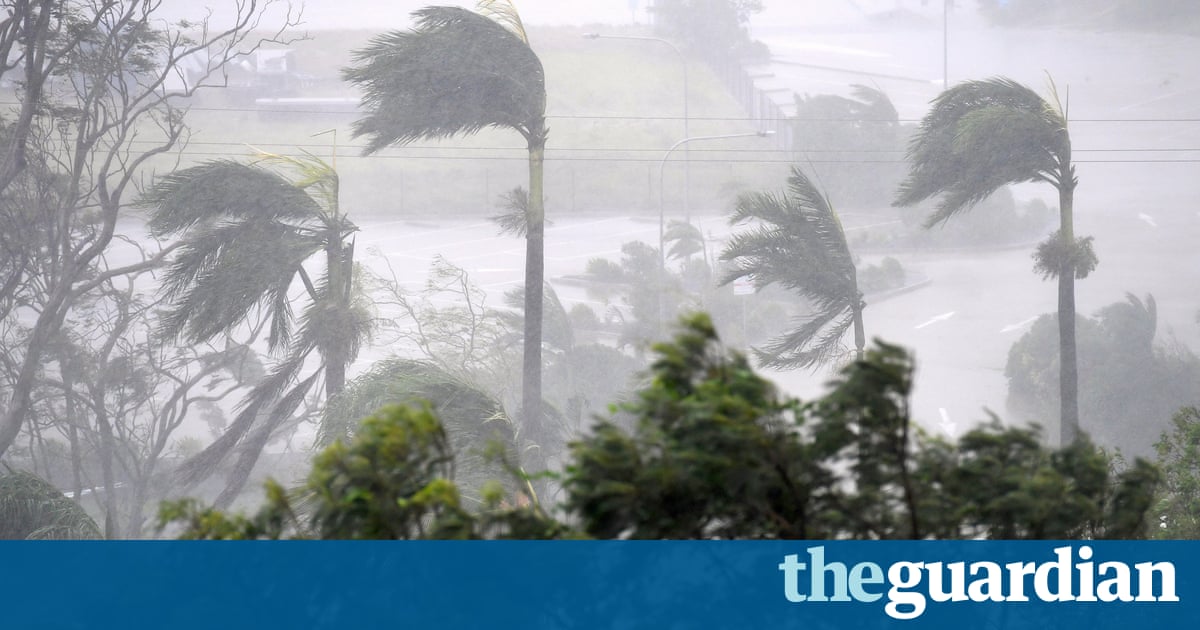 Cyclone Debbie batters Queensland coast with 'howling winds, torrential rain' – live updates