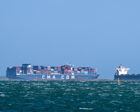 Malta-flagged container ship CMA CGM "Apollon Valletta" and the Panamean-flagged Wood Chips carrier "Green Sapphire" in the sea in Fos-sur-Mer, southern France on March 25, 2026