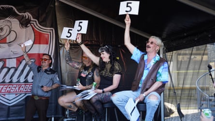 Judges hold scorecards at Denmark’s Mullet Championship