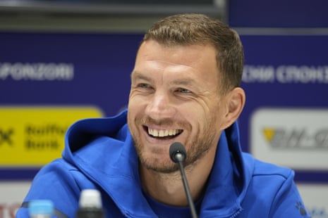 Edin Dzeko smiles as he talks to the media.