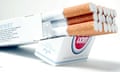 An open 20-pack of Lucky Strike cigarettes with the cigarettes coming out