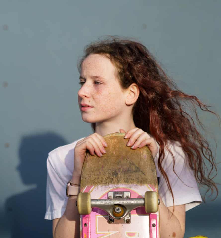 13-year-old Scottish skater Emily Rothney on her mini garden ramp in Carrbidge, Scotland. Emily is a talented local snowboarder and snowboarder.