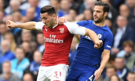 Arsenal’s Sead Kolasinac keeps Cesc Fabregas at bay at Stamford Bridge