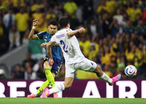 Luis Diaz shoots to score