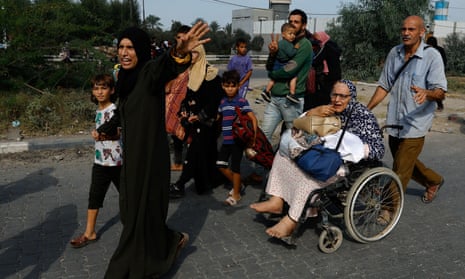 Palestinians fleeing northern Gaza move southward, in a photo taken in central Gaza Strip.