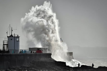 Huge waves at Porthcawl, Wales: there will be more extreme storms and longer droughts.