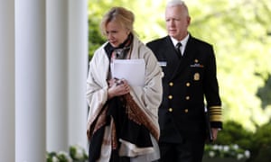 Dr Deborah Birx and Brett Giroir walk to the Rose Garden to attend a coronavirus briefing with Donald Trump, 27 April 2020.