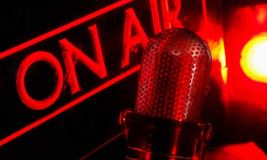 An 'On Air' radio sign with microphone.