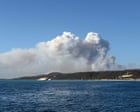 Australia news live: fire danger warnings in Queensland as crews battle Moreton Island blaze