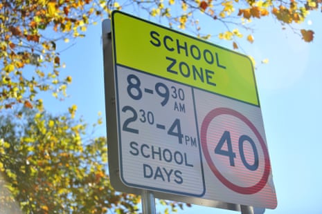 A sign warning of a school zone 