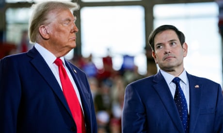 Donald Trump and Marco Rubio standing side buy side