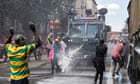 Kenyan police open fire on protesters as crowd try to storm parliament